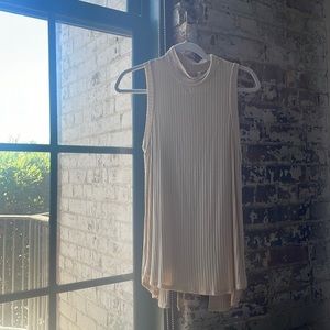 Tan/beige Solemio tank, laces up in the back, slight mock neck, lightweight